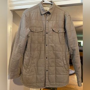 Men’s beige Sherpa lined jacket.